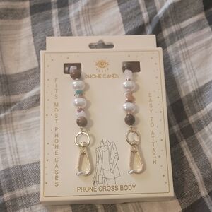 NIB / NWT Phone Eye Candy Cell Phone Crossbody Chain. NEVER OPENED, PERFECTION